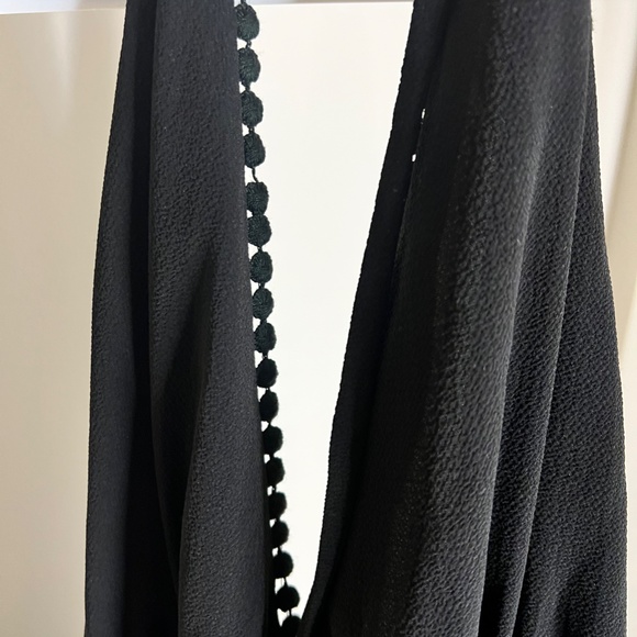 BLACK HALTER FIT AND FLARE JUMPSUIT - Picture 2 of 3